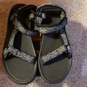 Teva men size 13 hurricane sandal. Black and gray new in box.